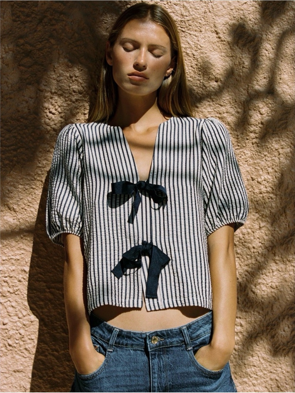 Zara striped navy and white striped puff sleeve top with front bows